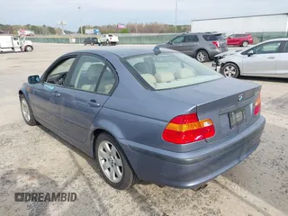 2005 BMW 3 Series 325i with VIN WBAET37445NJ85538, listed as a IAAI auction lot 41872686 with 121,237 mi miles. Bid and sale history available at carsss.com. Image 3.