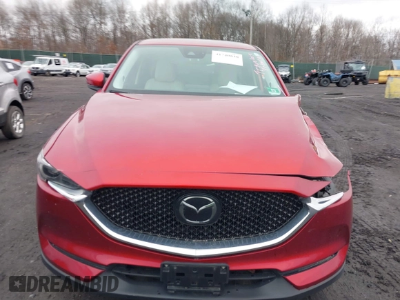 2018 Mazda CX-5 Grand Touring with VIN JM3KFBDM0J0427753, listed as a IAAI auction lot 41740838 with 69,683 mi miles and . Bid and sale history available at DreamBid. Image 12.