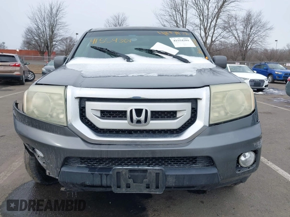 2011 Honda Pilot EX-L with VIN 5FNYF4H65BB009279, listed as a IAAI auction lot 41554301 with 226,337 mi miles and . Bid and sale history available at carsss.com. Image 12.