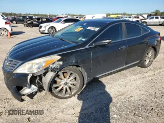 2012 Hyundai Azera z VIN KMHFH4JG0CA161867, wystawiony jako Copart lot #86928654 z przebiegiem 243 946 mil mil oraz Czysty tytuł • Clean title. Historia ofert i sprzedaży dostępna na DreamBid. Obrazek 1.