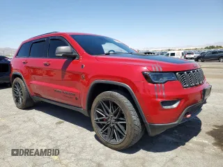 2019 Jeep Grand Cherokee Trailhawk with VIN 1C4RJFLT4KC787940, listed as a Copart auction lot 60883895 with 77,160 mi miles and Salvage title. Bid and sale history available at DreamBid. Image 4.