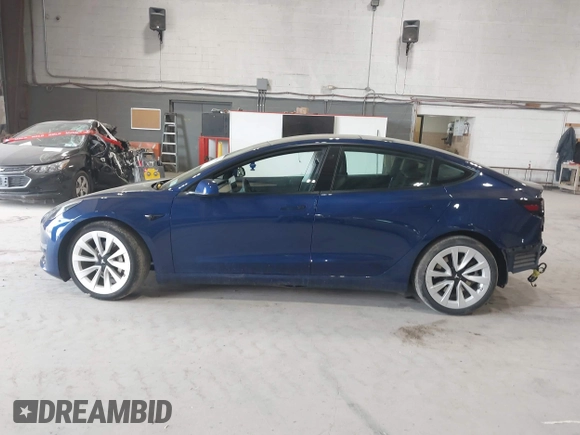2022 Tesla Model 3 Long Range with VIN 5YJ3E1EB8NF255163, listed as a IAAI auction lot 42105451 with 40,166 mi miles and . Bid and sale history available at DreamBid. Image 14.