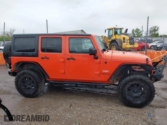 2015 Jeep Wrangler Unlimited Sahara with VIN 1C4BJWEG6FL603265, listed as a IAAI auction lot 41956606 with 70,983 mi miles. Bid and sale history available at carsss.com. Image 13.