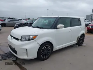 2013 Scion xB with VIN JTLZE4FE4DJ036152, listed as a IAAI auction lot 41959299 with 435,064 mi miles. Bid and sale history available at carsss.com. Image 2.