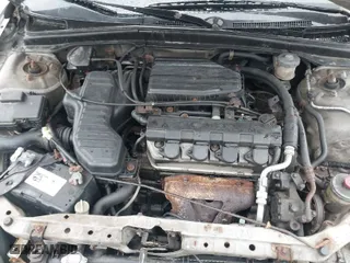 2002 Honda Civic LX with VIN 2HGES16662H567931, listed as a IAAI auction lot 41857814 with 191,087 mi miles. Bid and sale history available at carsss.com. Image 10.