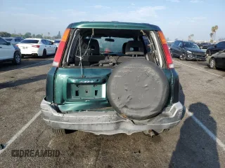 2000 Honda CR-V EX with VIN JHLRD1861YC020765, listed as a Copart auction lot 74510874 with 125,654 mi miles and Salvage Title. Bid and sale history available at carsss.com. Image 6.