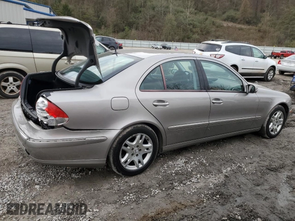 2003 Mercedes-Benz E 320 with VIN WDBUF65J23A297936, listed as a Copart auction lot 80877004 with 214,478 mi miles and Salvage Title. Bid and sale history available at DreamBid. Image 3.