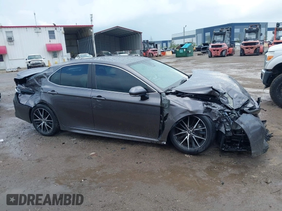 2023 Toyota Camry SE z VIN 4T1T11AK8PU802097, wystawiony jako IAAI lot #42389754 z przebiegiem 19 732 mil mil oraz . Historia ofert i sprzedaży dostępna na DreamBid. Obrazek 13.