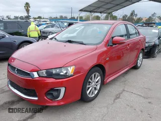 2016 Mitsubishi Lancer ES with VIN JA32U2FU4GU008882, listed as a IAAI auction lot 41600017 with 134,772 mi miles. Bid and sale history available at carsss.com. Image 2.