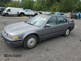 1990 Honda Accord EX with VIN JHMCB7563LC072616, listed as a Copart auction lot 67892284 with 218,918 mi miles and Salvage Title. Bid and sale history available at carsss.com. Image 1.