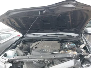 2014 Toyota Tacoma z VIN 3TMMU4FN9EM066292, wystawiony jako IAAI lot #41542492 z przebiegiem 122 308 mil mil oraz . Historia ofert i sprzedaży dostępna na DreamBid. Obrazek 10.