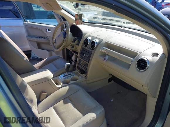 2005 Ford Freestyle SEL z VIN 1FMZK021X5GA46212, wystawiony jako IAAI lot #41779597 z przebiegiem 147 994 mil mil oraz . Historia ofert i sprzedaży dostępna na DreamBid. Obrazek 5.