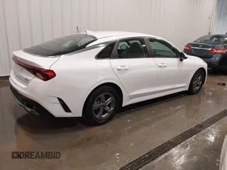 2023 Kia K5 LXS z VIN 5XXG14J2XPG189462, wystawiony jako IAAI lot #42233595 z przebiegiem 17 286 mil mil oraz . Historia ofert i sprzedaży dostępna na DreamBid. Obrazek 4.