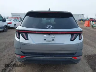 2022 Hyundai Tucson SEL z VIN 5NMJBCAE3NH070531, wystawiony jako IAAI lot #41222494 z przebiegiem 91 358 mil mil oraz . Historia ofert i sprzedaży dostępna na DreamBid. Obrazek 16.