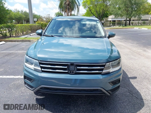 2019 Volkswagen Tiguan SE with VIN 3VV3B7AX8KM171057, listed as a IAAI auction lot 42209509 with 99,437 mi miles and . Bid and sale history available at DreamBid. Image 6.