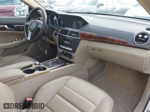 2015 Mercedes-Benz C 250 with VIN WDDGJ4HB9FG370183, listed as a IAAI auction lot 42670705 with 127,582 mi miles and . Bid and sale history available at DreamBid. Image 5.