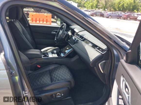 2020 Land Rover Range Rover Velar z VIN SALYU2EE1LA258140, wystawiony jako IAAI lot #42326439 z przebiegiem 61 827 mil mil oraz . Historia ofert i sprzedaży dostępna na DreamBid. Obrazek 5.