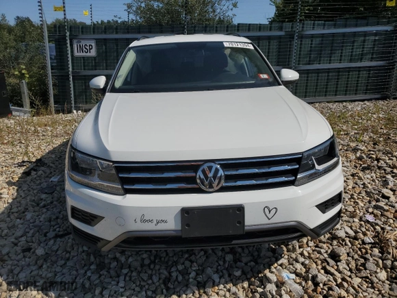 2020 Volkswagen Tiguan SE with VIN 3VV2B7AX5LM111699, listed as a Copart auction lot 70121394 with 32,217 mi miles and Salvage Title. Bid and sale history available at carsss.com. Image 5.