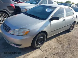 2004 Toyota Corolla CE with VIN 1NXBR32E64Z236073, listed as a IAAI auction lot 41955303 with 244,584 mi miles and . Bid and sale history available at DreamBid. Image 2.