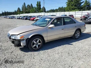 2001 Toyota Camry CE z VIN JT2BG22K610604435, wystawiony jako Copart lot #58017855 z przebiegiem 130 984 mil mil oraz Szkoda całkowita • Salvage title. Historia ofert i sprzedaży dostępna na DreamBid. Obrazek 1.
