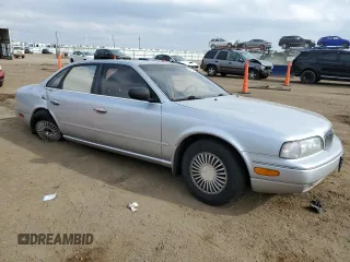 1996 Infiniti Q45 z VIN JNKNG01D1TM404004, wystawiony jako Copart lot #54433905 z przebiegiem 157 775 mil mil oraz Nie do naprawy. Historia ofert i sprzedaży dostępna na DreamBid. Obrazek 4.