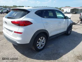 2019 Hyundai Tucson Value with VIN KM8J33A43KU065995, listed as a IAAI auction lot 41720471 with 95,732 mi miles. Bid and sale history available at carsss.com. Image 4.