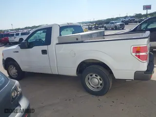 2014 Ford F-150 XL with VIN 1FTMF1CM6EKD83555, listed as a IAAI auction lot 41540710 with 122,107 mi miles. Bid and sale history available at carsss.com. Image 14.