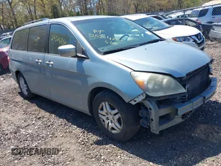 2006 Honda Odyssey EX-L z VIN 5FNRL38786B105476, wystawiony jako IAAI lot #42141512 z przebiegiem Nie podano mil oraz . Historia ofert i sprzedaży dostępna na DreamBid. Obrazek 1.