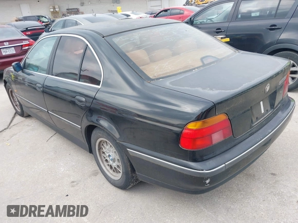 1997 BMW 5 Series 528i z VIN WBADD6321VBW05322, wystawiony jako IAAI lot #42284323 z przebiegiem 200 441 mil mil oraz . Historia ofert i sprzedaży dostępna na DreamBid. Obrazek 3.