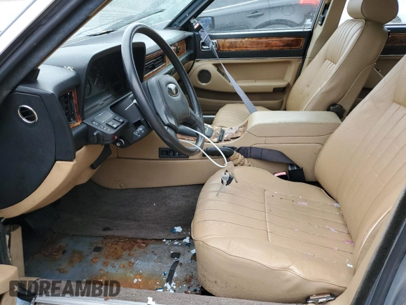 1989 Jaguar XJ with VIN SAJHY1540KC578115, listed as a Copart auction lot 69142274 with Not Provided miles and Clean Title. Bid and sale history available at DreamBid. Image 7.