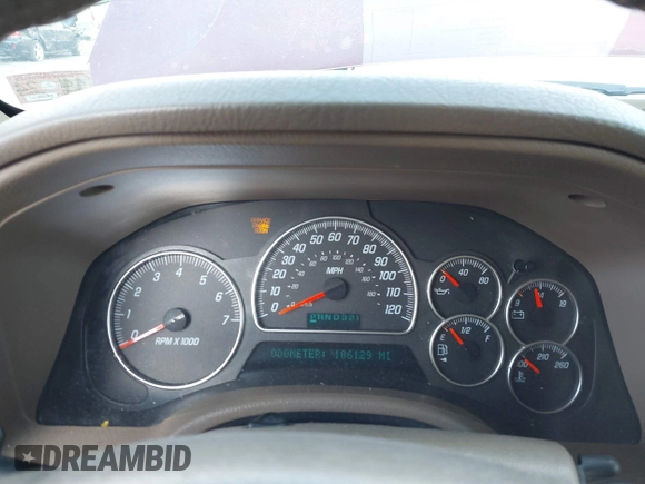2004 GMC Envoy SLE with VIN 1GKDS13S342287315, listed as a IAAI auction lot 41486715 with 186,129 mi miles. Bid and sale history available at carsss.com. Image 7.