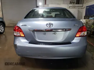 2010 Toyota Yaris with VIN JTDBT4K35A4064446, listed as a Copart auction lot 52099855 with 61,934 mi miles and Salvage Title. Bid and sale history available at carsss.com. Image 6.