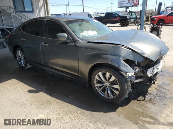 2013 Infiniti M with VIN JN1BY1APXDM510926, listed as a Copart auction lot 51700125 with 111,045 mi miles and Salvage title. Bid and sale history available at DreamBid. Image 4.