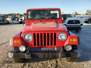 2003 Jeep Wrangler Sport with VIN 1J4FA49S43P332645, listed as a Copart auction lot 77424814 with 165,909 mi miles and Non Repairable. Bid and sale history available at carsss.com. Image 5.