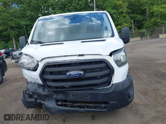 2020 Ford Transit Cargo z VIN 1FTBR2Y80LKB22354, wystawiony jako IAAI lot #42347579 z przebiegiem 64 513 mil mil oraz . Historia ofert i sprzedaży dostępna na DreamBid. Obrazek 12.