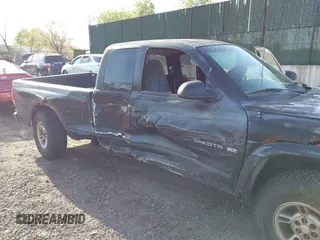 1999 Dodge Dakota SLT with VIN 1B7GG22X8XS115282, listed as a IAAI auction lot 42136576 with 220,465 mi miles and . Bid and sale history available at carsss.com. Image 6.