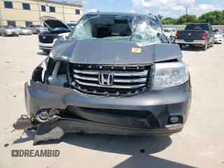 2013 Honda Pilot Touring z VIN 5FNYF3H97DB032389, wystawiony jako Copart lot #58387645 z przebiegiem Nie podano mil oraz Szkoda całkowita • Salvage title. Historia ofert i sprzedaży dostępna na DreamBid. Obrazek 5.