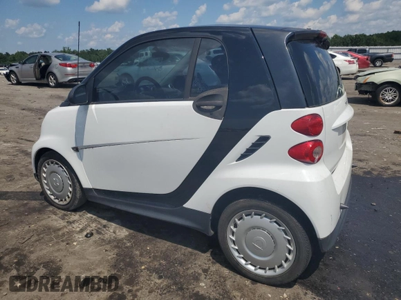 2015 Smart fortwo Passion with VIN WMEEJ3BA6FK819930, listed as a Copart auction lot 64722495 with 106,124 mi miles and Clean title. Bid and sale history available at DreamBid. Image 2.
