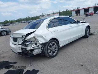 2015 Mercedes-Benz C 300 Luxury with VIN 55SWF4KB9FU033439, listed as a IAAI auction lot 42056388 with 105,952 mi miles and . Bid and sale history available at DreamBid. Image 4.