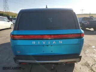2023 Rivian R1S Adventure with VIN 7PDSGABA5PN027894, listed as a Copart auction lot 71442484 with 4,456 mi miles and Salvage Title. Bid and sale history available at carsss.com. Image 6.