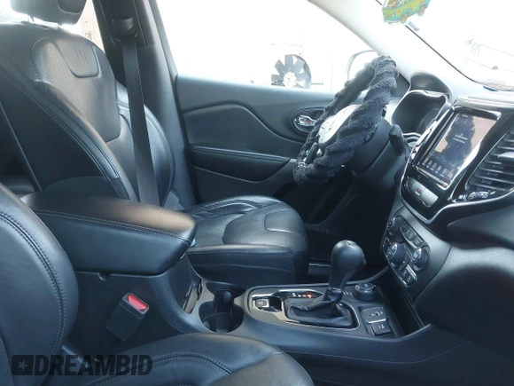 2020 Jeep Cherokee Limited with VIN 1C4PJMDXXLD612052, listed as a IAAI auction lot 42582343 with 96,072 mi miles and . Bid and sale history available at DreamBid. Image 5.