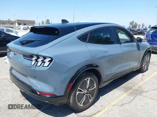 2023 Ford Mustang Mach-E Premium z VIN 3FMTK3R47PMA60861, wystawiony jako IAAI lot #42311615 z przebiegiem 27 469 mil mil oraz . Historia ofert i sprzedaży dostępna na DreamBid. Obrazek 4.
