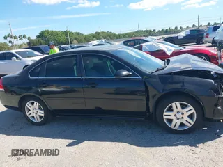 2014 Chevrolet Impala LT with VIN 2G1WB5E30E1156385, listed as a IAAI auction lot 41837008 with 194,732 mi miles and . Bid and sale history available at DreamBid. Image 13.
