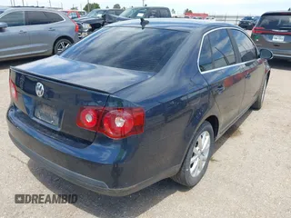 2010 Volkswagen Jetta Limited Edition with VIN 3VWRX7AJ1AM067933, listed as a IAAI auction lot 42153235 with 127,051 mi miles and . Bid and sale history available at DreamBid. Image 4.
