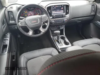 2016 GMC Canyon 4WD SLE with VIN 1GTG6CE36G1374456, listed as a Copart auction lot 52864115 with 63,892 mi miles and Salvage title. Bid and sale history available at DreamBid. Image 8.