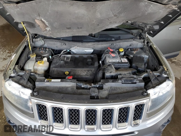 2014 Jeep Compass Sport with VIN 1C4NJDBB6ED592223, listed as a Copart auction lot 63343984 with 124,942 mi miles and Clean Title. Bid and sale history available at carsss.com. Image 12.