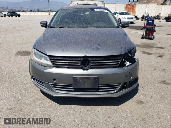 2013 Volkswagen Jetta SE with VIN 3VWDP7AJ5DM355176, listed as a Copart auction lot 60324525 with 192,226 mi miles and Salvage title. Bid and sale history available at DreamBid. Image 5.