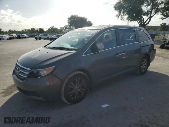 2012 Honda Odyssey EX-L with VIN 5FNRL5H66CB146350, listed as a Copart auction lot 55428555 with 171,207 mi miles and Salvage Title. Bid and sale history available at DreamBid. Image 1.