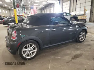 2013 MINI Roadster S z VIN WMWSY3C57DT593979, wystawiony jako Copart lot #68924454 z przebiegiem 61 578 mil mil oraz Szkody całkowita. Historia ofert i sprzedaży dostępna na DreamBid. Obrazek 3.