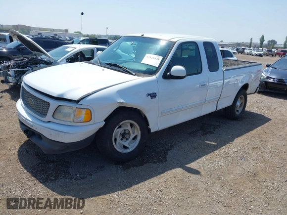 2000 Ford F-150 XL with VIN 1FTRX17L2YNA03263, listed as a IAAI auction lot 42326528 with Not provided miles and . Bid and sale history available at DreamBid. Image 18.